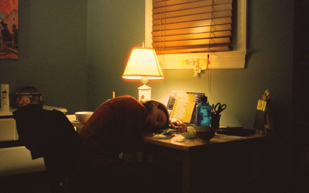 Tired Professional Resting Reflection Window Desk