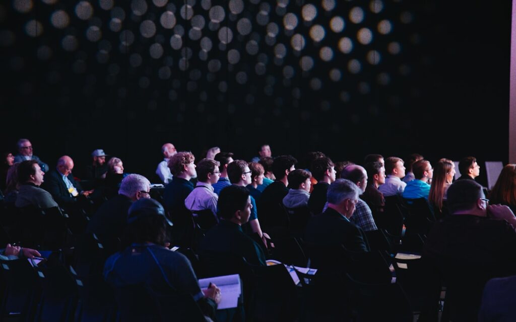 Professional Speaking Conference Stage Audience