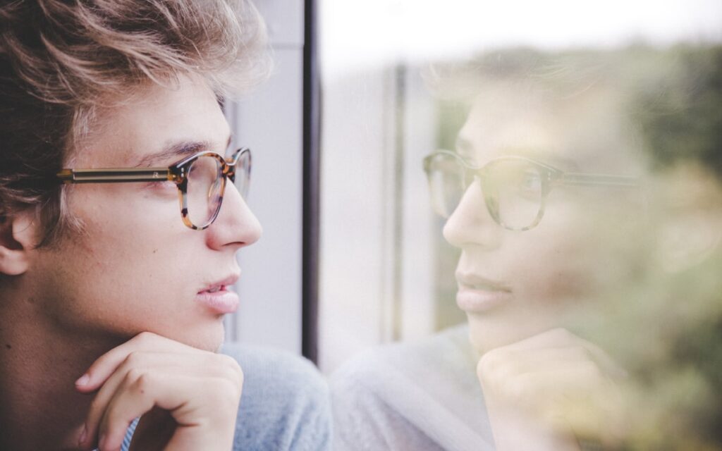 Thoughtful Professional Reflection Window Office